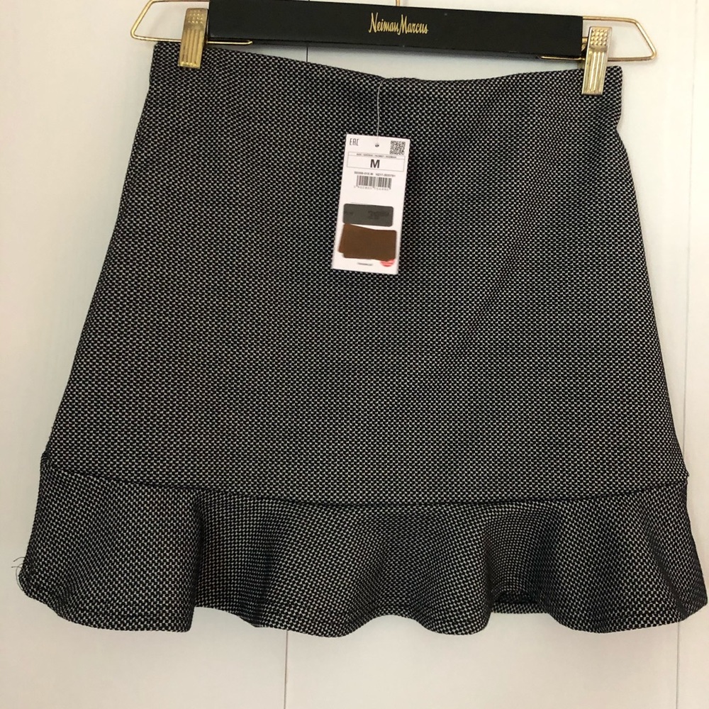 Mini skirt with flounce